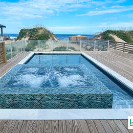 Pool & spa w/ Tozen 1x2 in Iodine Natural by Lunada Bay Tile